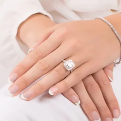 18ct White Gold 1.00 Carat Baguette and Round Brilliant Diamond Halo Cluster Ring