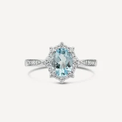 9ct White Gold 0.19ct Oval Aquamarine & Diamond Star Halo Ring