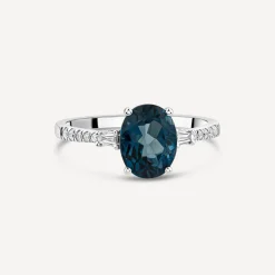 9ct White Gold London Blue Topaz & 0.12ct Tapered Baguette Diamond Sides Ring