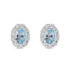 9ct White Gold Oval Blue Topaz Centre 0.05ct Diamond Cluster Stud Earrings