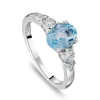 9ct White Gold Oval Blue Topaz Centre 0.14ct Diamond Trefoil Sides Ring