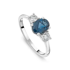 9ct White Gold Oval Blue Topaz & 0.15ct Diamond Sides Ring