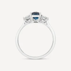 9ct White Gold Oval Blue Topaz & 0.15ct Diamond Sides Ring