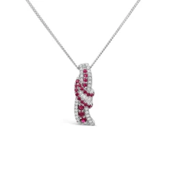 9ct White Gold Ruby & 0.13ct Diamond Baguette Centre Wave Pendant
