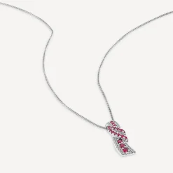 9ct White Gold Ruby & 0.13ct Diamond Baguette Centre Wave Pendant