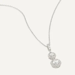 9ct White Gold Two Cubic Zirconia Halo's & Cubic Zirconia Bale Pendant