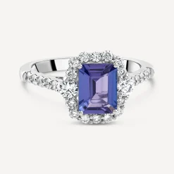 Platinum Emerald Cut Tanzanite Centre Diamond Halo & Shoulders Ring