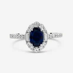 Platinum Sapphire Centre 0.48ct Diamond Halo Baguette & Shoulders Ring