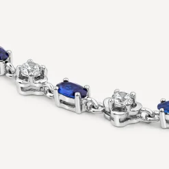 Sterling Silver Cubic Zirconia Flower & Blue Stone Bracelet