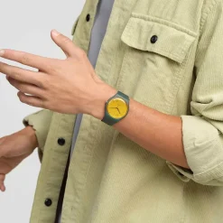 Swatch Gold in The Garden 41mm Yellow Dial Green Strap Watch